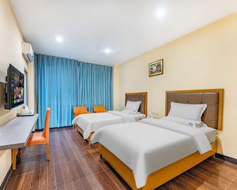 Shenzhen Kaixin Hotel - שנג'ן - חדר שינה