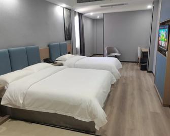 Greentree Inn Anqing Tongcheng South Shengtang Road Shengtang International Business Hotel - Anqing - Bedroom