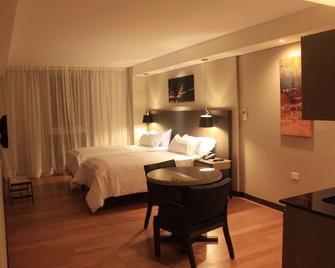 Axsur Design Hotel - Montevideo - Schlafzimmer