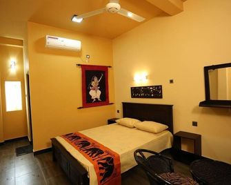 Edwin's Airport Garden - נגומבו - חדר שינה