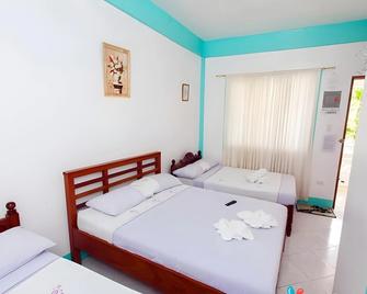 Palm Grove Saud Holiday Complex Hotel - Pagudpud - Chambre