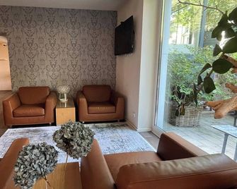 Dormero Hotel Essen - Essen - Living room