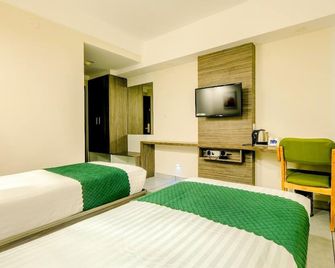 The Heartland Business Hotel - Thiruvananthapuram - Yatak Odası