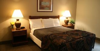 Affordable Suites of America - Jacksonville - Schlafzimmer
