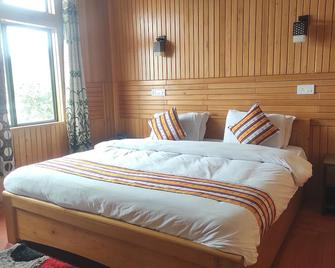 Hotel Tayatha - Tawang - Bedroom