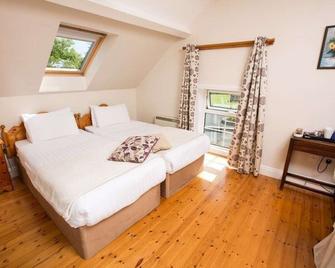 O'briens Cashel Lodge - Cashel - Спальня