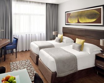 Mövenpick Hotel Apartments Al Mamzar Dubai - Dubai - Bedroom