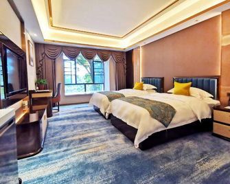 Lotus Garden Hotel - Shaoguan - Camera da letto