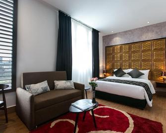 Belllo Hotel JB Central - ג'והור באהרו - חדר שינה