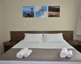 Hotel Brasil - Guanhães - Camera da letto