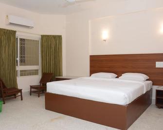 Sree Parthi Hotel - Puttaparthi - Camera da letto