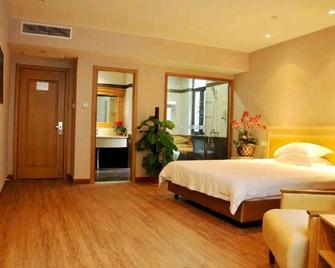 Yueli Holiday Hotel - Šao-sing - Ložnice