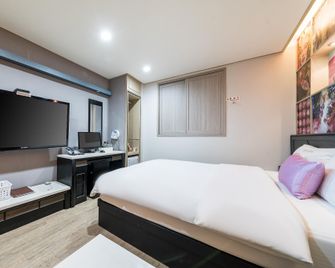 Gyeongju Zara Motel - Gyeongju - Schlafzimmer