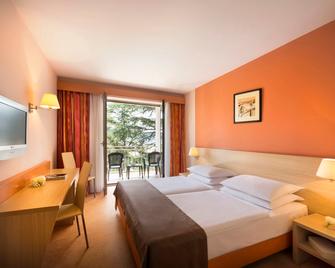 ريميسينز هوتل لوكيجا - بورتوروز - غرفة نوم