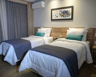 Dubai Suites - Montes Claros - Quarto