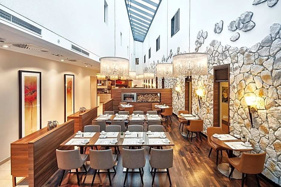 H4 Hotel Münster - מינסטר - מסעדה