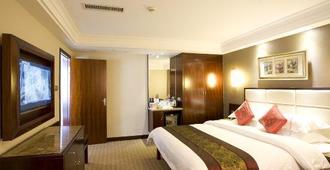 Shen Long Bai Du Hotel - Hengyang - Bedroom