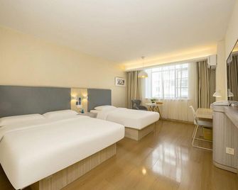 Home Inn Huayi Selected Hotel (Xichang Qionghai 17 Degrees wanda plaza Branch) - Liangshan - Schlafzimmer
