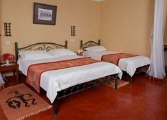 Ashnil Aruba Lodge - Voi - Slaapkamer