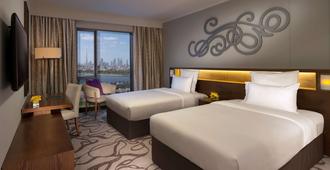 Pullman Dubai Creek City Centre Residences - Dubai - Phòng ngủ