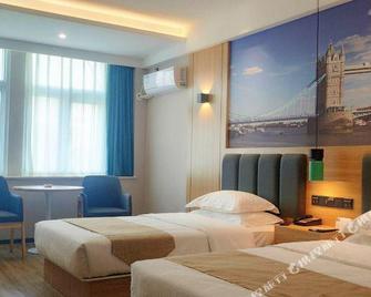 Greentree Inn Qinyang Middle Huaifu Road Express Hotel - Jiaozuo - Bedroom