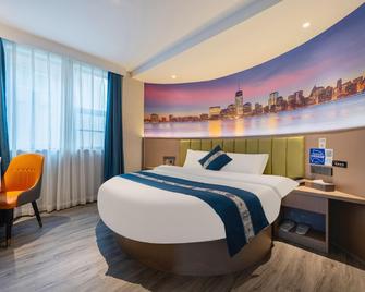 Vienna Hotel Jian People Square - Ji'an - Slaapkamer