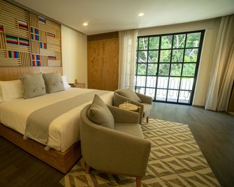 Hotel Dex Tlaquepaque - Гвадалахара - Спальня