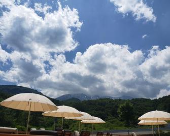 Hotel Kiso Onsen Kogane no Yu Glamping Ontake - Kiso - Patio