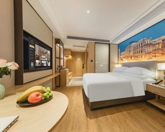 Vienna International Hotel Fujian Zhangzhou Changtai - Zhangzhou - Schlafzimmer