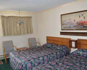 Capri Motel By OYO Elwood, Wathena - Wathena - Schlafzimmer