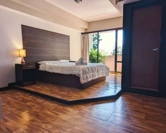 Casa Buena Hotel - Quetzaltenango - Bedroom