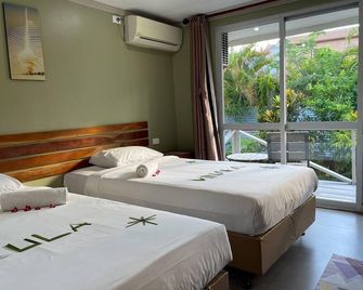 Beach Escape Resort - נאדי - חדר שינה