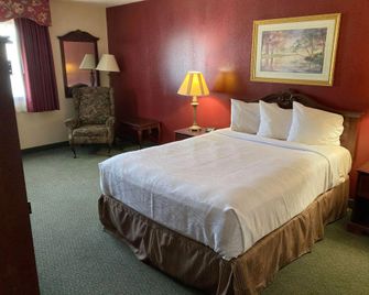 The Jeffreys Hotel Extended Stay - Osceola - Ložnice