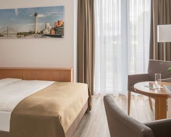 Hotel Chrisma - Düsseldorf - Phòng ngủ