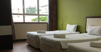 Disini Hotel - Kota Kinabalu - Bedroom