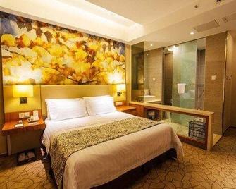 Jinjiang Metropolo Hotel - Taizhou Wanda Plaza - Taizhou - Bedroom