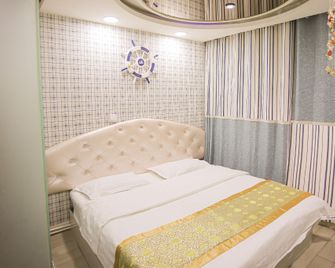 Shell Chain Hotel (Mudanjiang North Railway Station Guangsha Branch) - Mudanjiang - Camera da letto