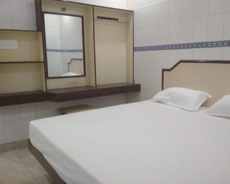 Abirami Inn - Kumbakonam - Bedroom