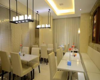 Jinjiang Inn Xianning Yinquan Avenue Hot Spring Hotel - Xianning - Restaurant