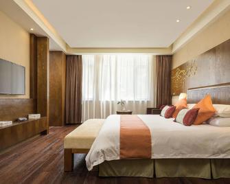 Julong Hotel - Chizhou - Bedroom