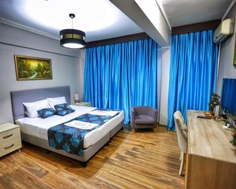 هوتل برينكيبوس - اسطنبول - غرفة نوم