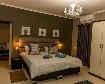 Village Boutique Hotel - Otjiwarongo - Slaapkamer