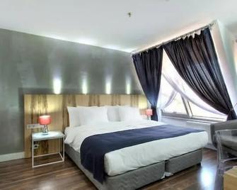 En Otel Karaca - Doryläum - Schlafzimmer