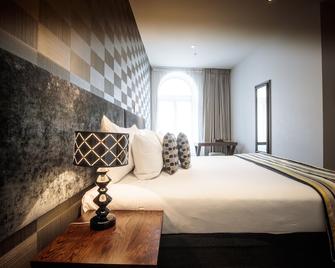 Hotel 115 Christchurch - כרייסטצ'רץ' - חדר שינה