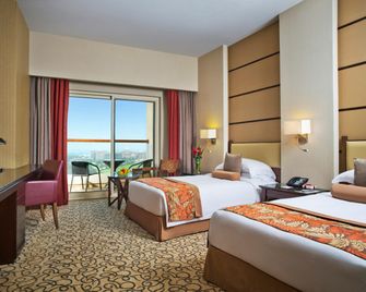 Khalidiya Palace Rayhaan By Rotana - אבו דאבי - חדר שינה