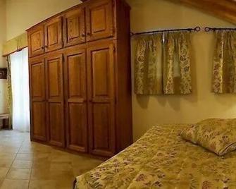 Hotel Villa Plinia - Pragelato - Schlafzimmer
