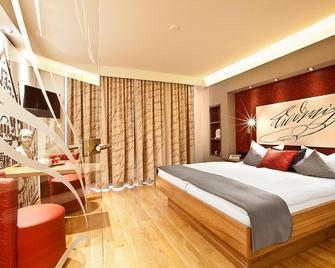 Hotel Weinbauer - Schwangau - Schlafzimmer