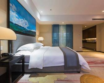 Chenxi Fengqing Hotel - Zhaoqing - Спальня