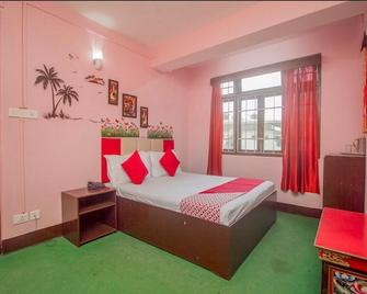 Hotel O Home Heritage Homestay - Kālimpong - Slaapkamer