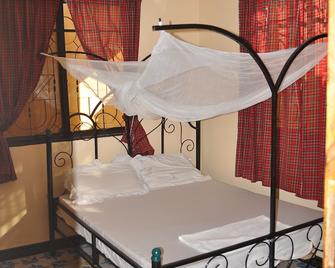 Dear my place is located at Bagamoyo Tanzania. Its a safe and memorable place. - Bagamoyo - Bedroom
